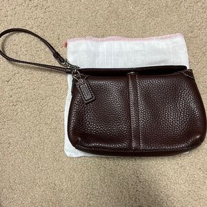Coach brown pebbles leather wristlet. Euc